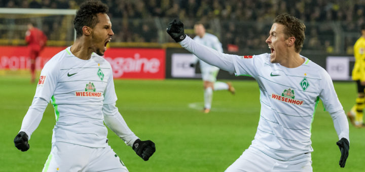 Werders Theo Gebre Selassie (links) und Max Kruse freuen sich über den Sieg in Dortmund. Foto: Nordphoto