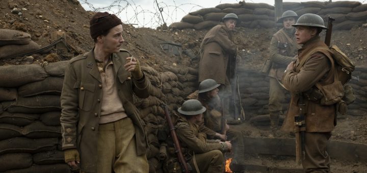 Lieutenant Leslie (Andrew Scott, left), Schofield (George MacKay, right), Blake (Dean-Charles Chapman, second from the right) with fellow soldiers in 1917, the new epic from Oscar®-winning filmmaker Sam Mendes.